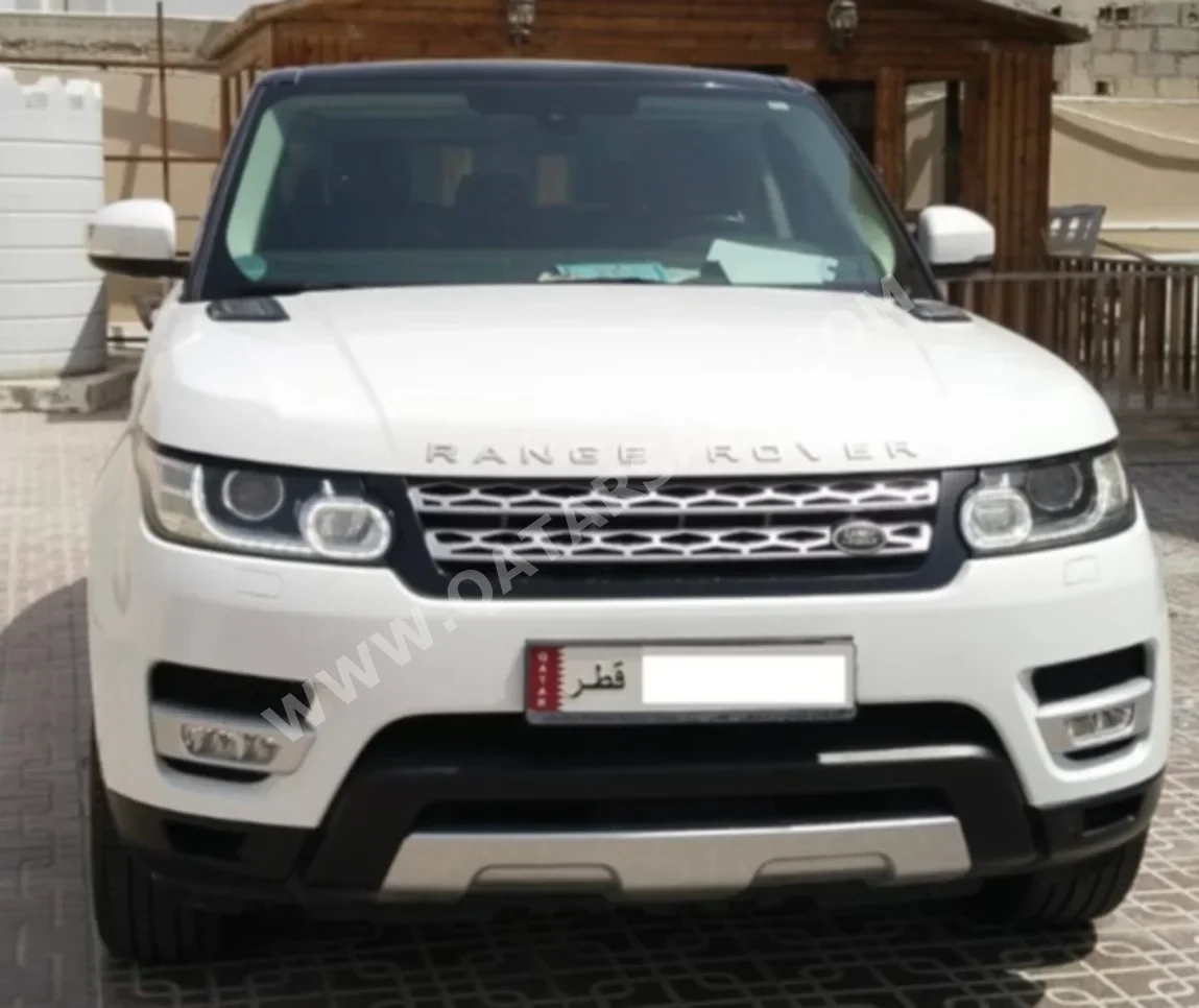 Land Rover  Range Rover  Sport  2014  Automatic  76,000 Km  6 Cylinder  Four Wheel Drive (4WD)  SUV  White