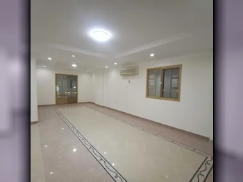 3 Bedrooms  Apartment  For Rent  in Doha -  Al Mansoura  Not Furnished