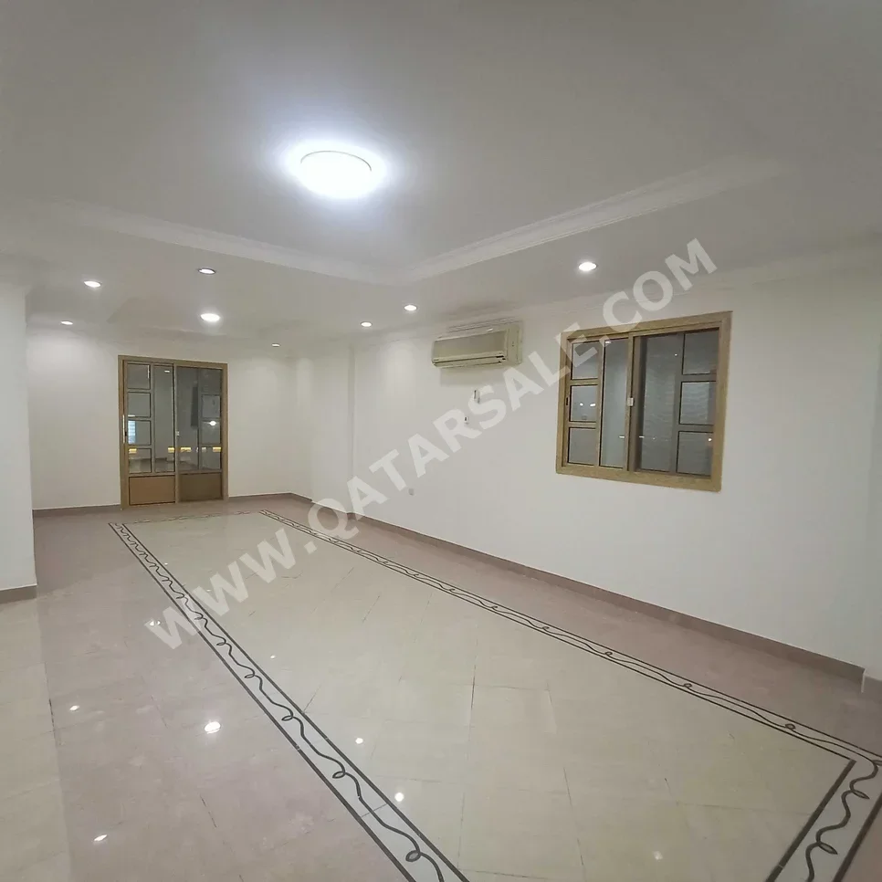 3 Bedrooms  Apartment  For Rent  in Doha -  Al Mansoura  Not Furnished