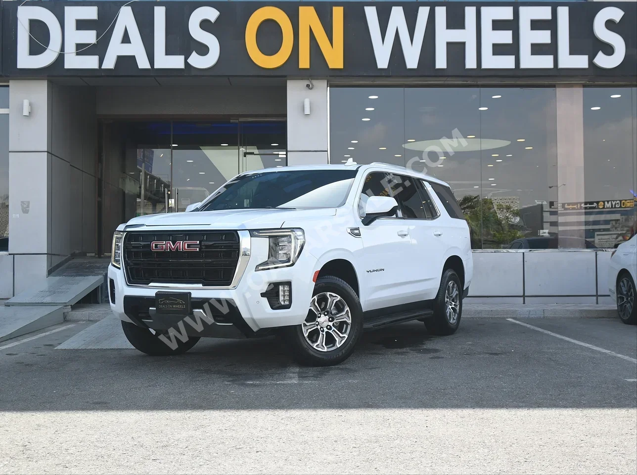 GMC  Yukon  SLE  2021  Automatic  28,000 Km  8 Cylinder  Rear Wheel Drive (RWD)  SUV  White  With Warranty