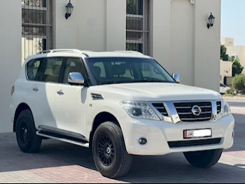 Nissan  Patrol  Platinum  2016  Automatic  140,000 Km  8 Cylinder  Four Wheel Drive (4WD)  SUV  White