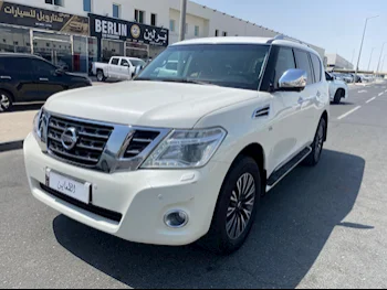 Nissan  Patrol  Platinum  2015  Automatic  280,000 Km  8 Cylinder  Four Wheel Drive (4WD)  SUV  White