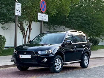 Mitsubishi  Outlander  Limited edition  2013  Automatic  76,000 Km  4 Cylinder  Four Wheel Drive (4WD)  SUV  Black