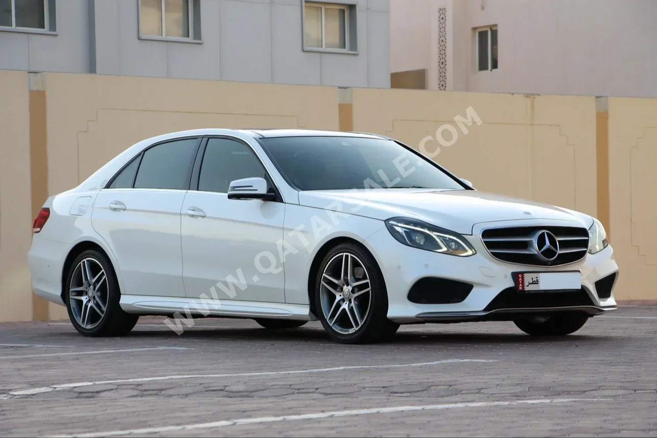 Mercedes-Benz  E-Class  300  2015  Automatic  95,000 Km  6 Cylinder  Rear Wheel Drive (RWD)  Sedan  Pearl