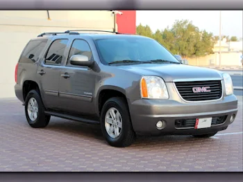  GMC  Yukon  2013  Automatic  220,000 Km  8 Cylinder  Four Wheel Drive (4WD)  SUV  Brown  With Warranty