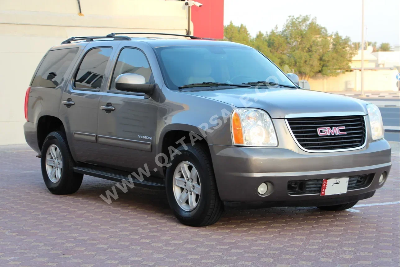  GMC  Yukon  2013  Automatic  220,000 Km  8 Cylinder  Four Wheel Drive (4WD)  SUV  Brown  With Warranty