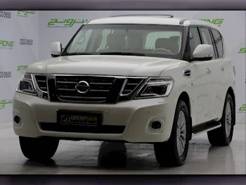 Nissan  Patrol  Titanium  2017  Automatic  144,620 Km  8 Cylinder  Four Wheel Drive (4WD)  SUV  Pearl