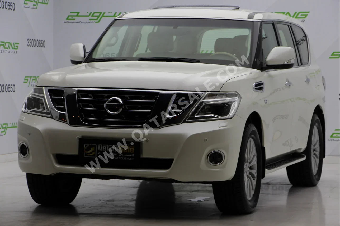 Nissan  Patrol  Titanium  2017  Automatic  144,620 Km  8 Cylinder  Four Wheel Drive (4WD)  SUV  Pearl