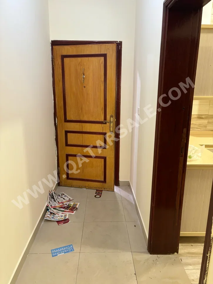 3 Bedrooms  Apartment  For Rent  in Doha -  New Doha  Not Furnished