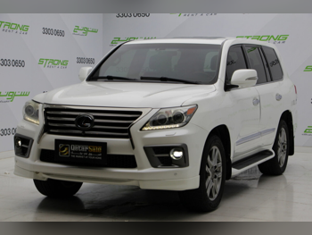 Lexus  LX  570 S  2014  Automatic  294,000 Km  8 Cylinder  Four Wheel Drive (4WD)  SUV  White