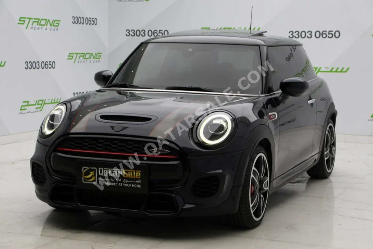 Mini  Cooper  JCW  2021  Automatic  79,000 Km  4 Cylinder  Front Wheel Drive (FWD)  Hatchback  Dark Blue  With Warranty