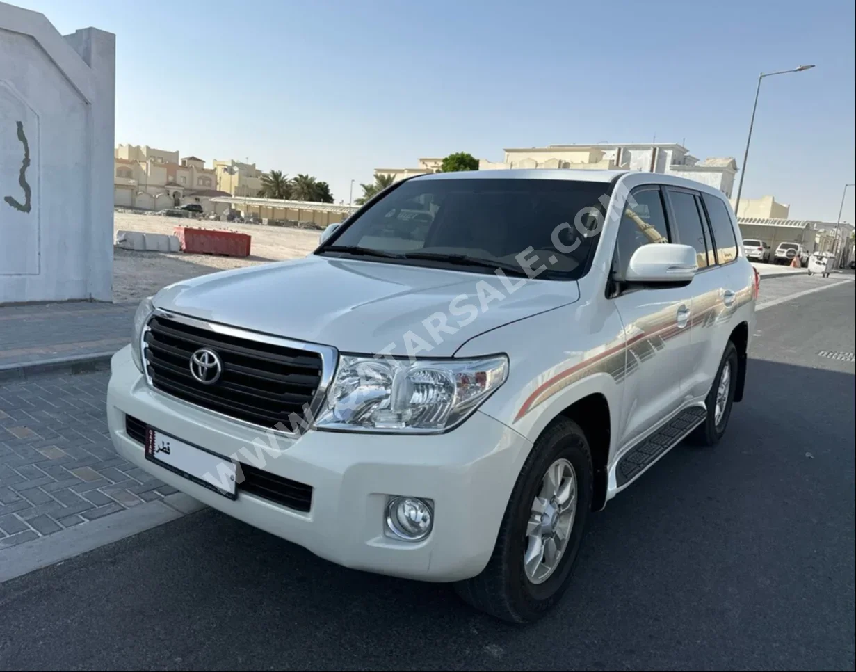 Toyota  Land Cruiser  GX  2012  Automatic  585,000 Km  6 Cylinder  Four Wheel Drive (4WD)  SUV  Pearl