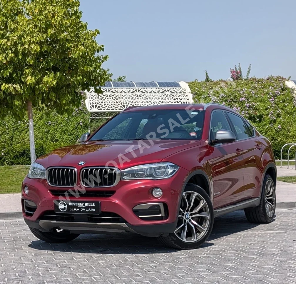 BMW  X-Series  X6 40i  2015  Automatic  152,000 Km  6 Cylinder  All Wheel Drive (AWD)  SUV  Red