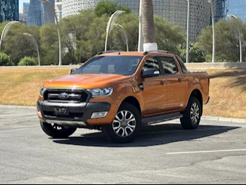 Ford  Ranger  Wildtrak  2017  Automatic  60,000 Km  6 Cylinder  Four Wheel Drive (4WD)  Pick Up  Orange