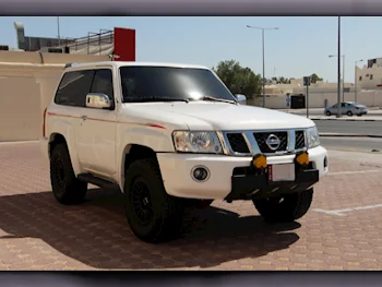 Nissan  Patrol  Safari  2022  Automatic  73,000 Km  6 Cylinder  Four Wheel Drive (4WD)  SUV  White  With Warranty