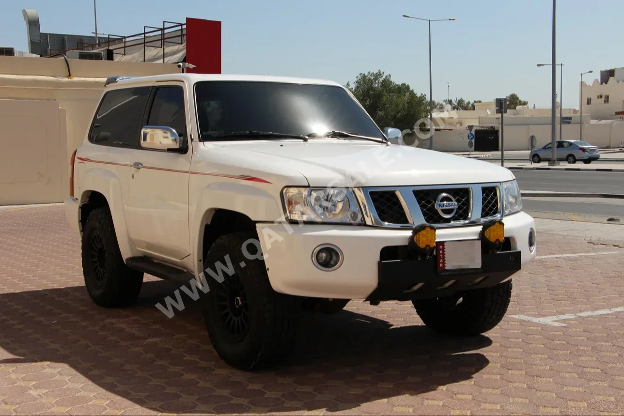 Nissan  Patrol  Safari  2022  Automatic  73,000 Km  6 Cylinder  Four Wheel Drive (4WD)  SUV  White  With Warranty