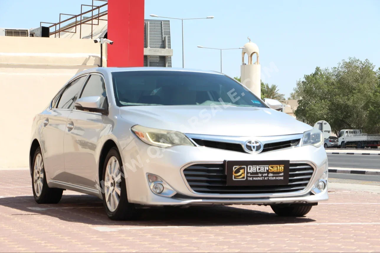 Toyota  Avalon  Limited  2013  Automatic  215,000 Km  6 Cylinder  Front Wheel Drive (FWD)  Sedan  Silver