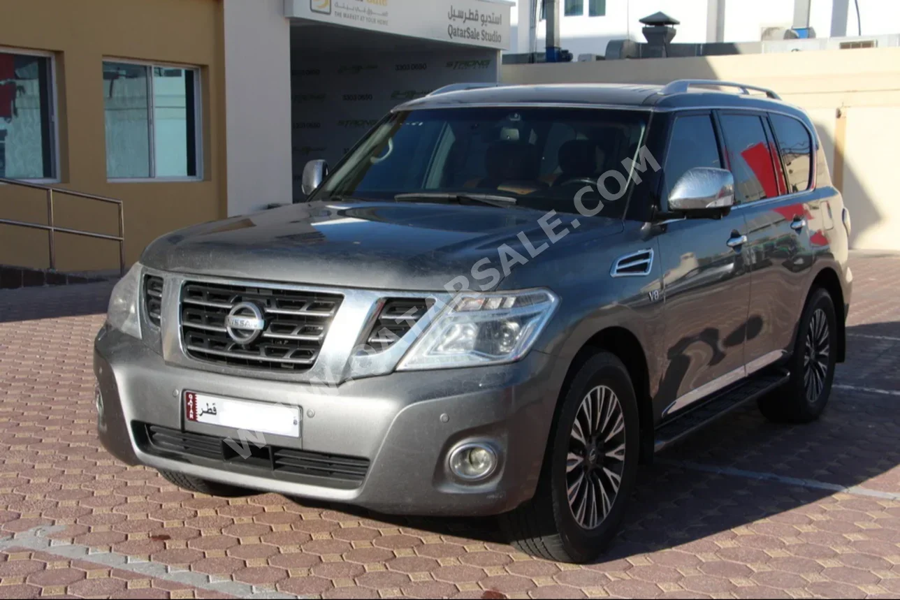 Nissan  Patrol  Platinum  2015  Automatic  231,000 Km  8 Cylinder  Four Wheel Drive (4WD)  SUV  Gray