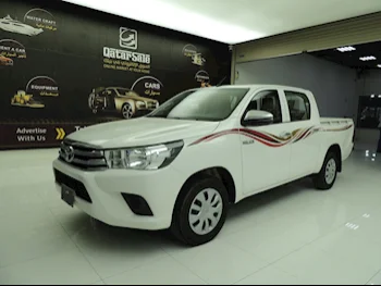 Toyota  Hilux  2021  Manual  78,000 Km  4 Cylinder  Rear Wheel Drive (RWD)  Pick Up  White  With Warranty