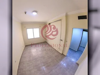 2 Bedrooms  Apartment  in Doha -  Umm Ghuwailina  Not Furnished