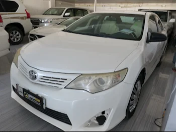 Toyota  Camry  2015  Automatic  211,000 Km  4 Cylinder  Front Wheel Drive (FWD)  Sedan  White