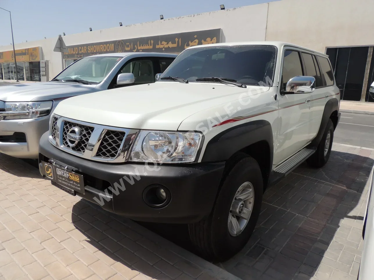 Nissan  Patrol  GL  2023  Automatic  28,000 Km  6 Cylinder  Four Wheel Drive (4WD)  SUV  White  With Warranty