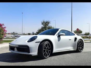 Porsche  911  2023  Automatic  3٬000 Km  6 Cylinder  Rear Wheel Drive (RWD)  Coupe / Sport  White  With Warranty