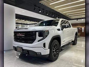 GMC  Sierra  Elevation  2023  Automatic  9,900 Km  8 Cylinder  Four Wheel Drive (4WD)  Pick Up  White  With Warranty