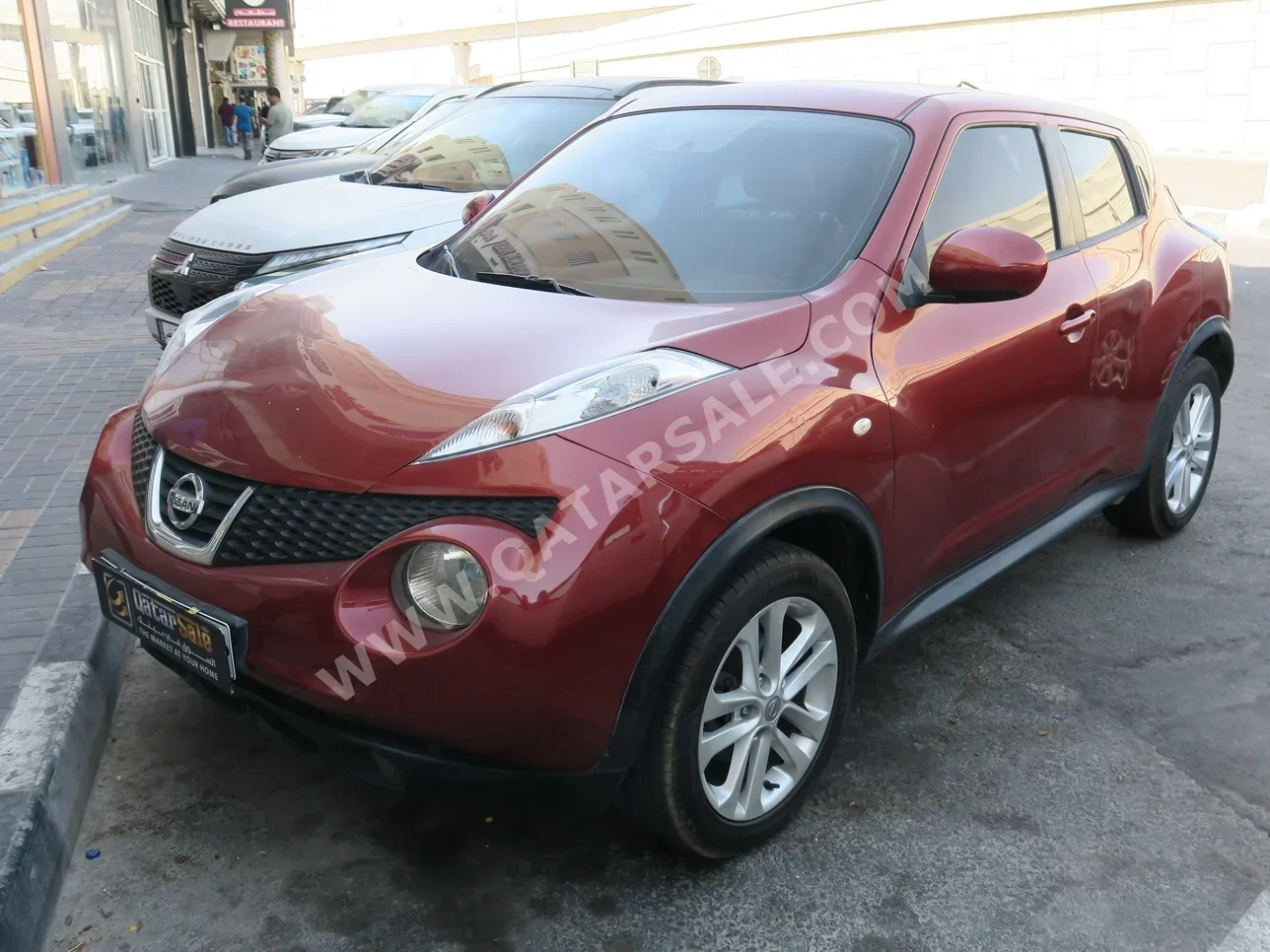 Nissan  Juke  2014  Automatic  142,000 Km  4 Cylinder  Front Wheel Drive (FWD)  SUV  Red