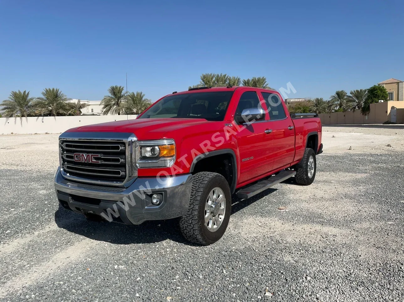 GMC  Sierra  2500 HD  2015  Automatic  95,500 Km  8 Cylinder  Four Wheel Drive (4WD)  Pick Up  Red