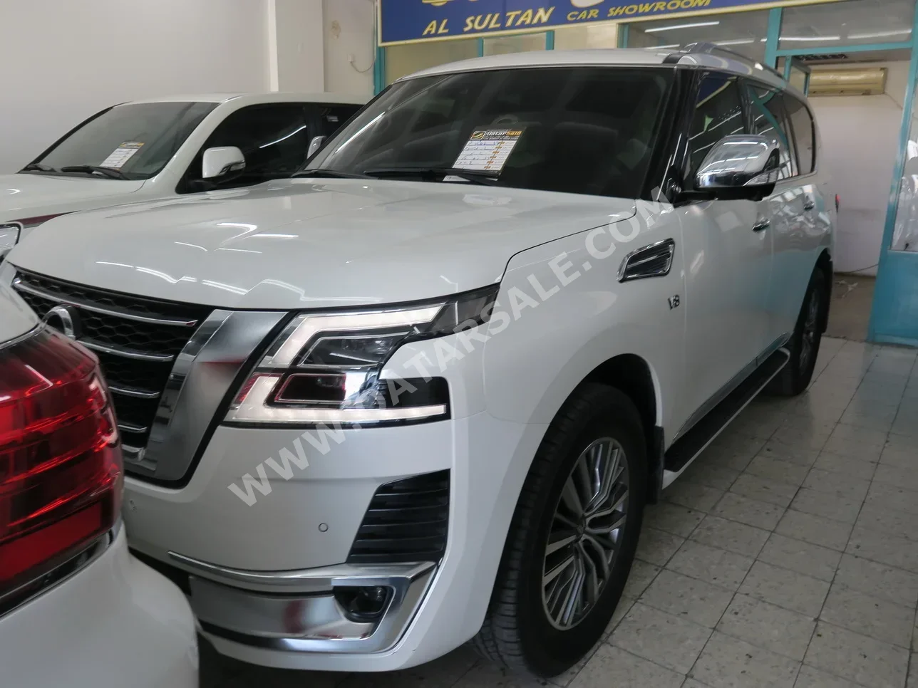 Nissan  Patrol  Platinum  2020  Automatic  24,000 Km  8 Cylinder  Four Wheel Drive (4WD)  SUV  White  With Warranty