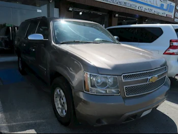 Chevrolet  Suburban  2013  Automatic  133,000 Km  8 Cylinder  Four Wheel Drive (4WD)  SUV  Silver