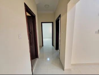 2 Bedrooms  Apartment  in Doha -  Umm Ghuwailina  Not Furnished