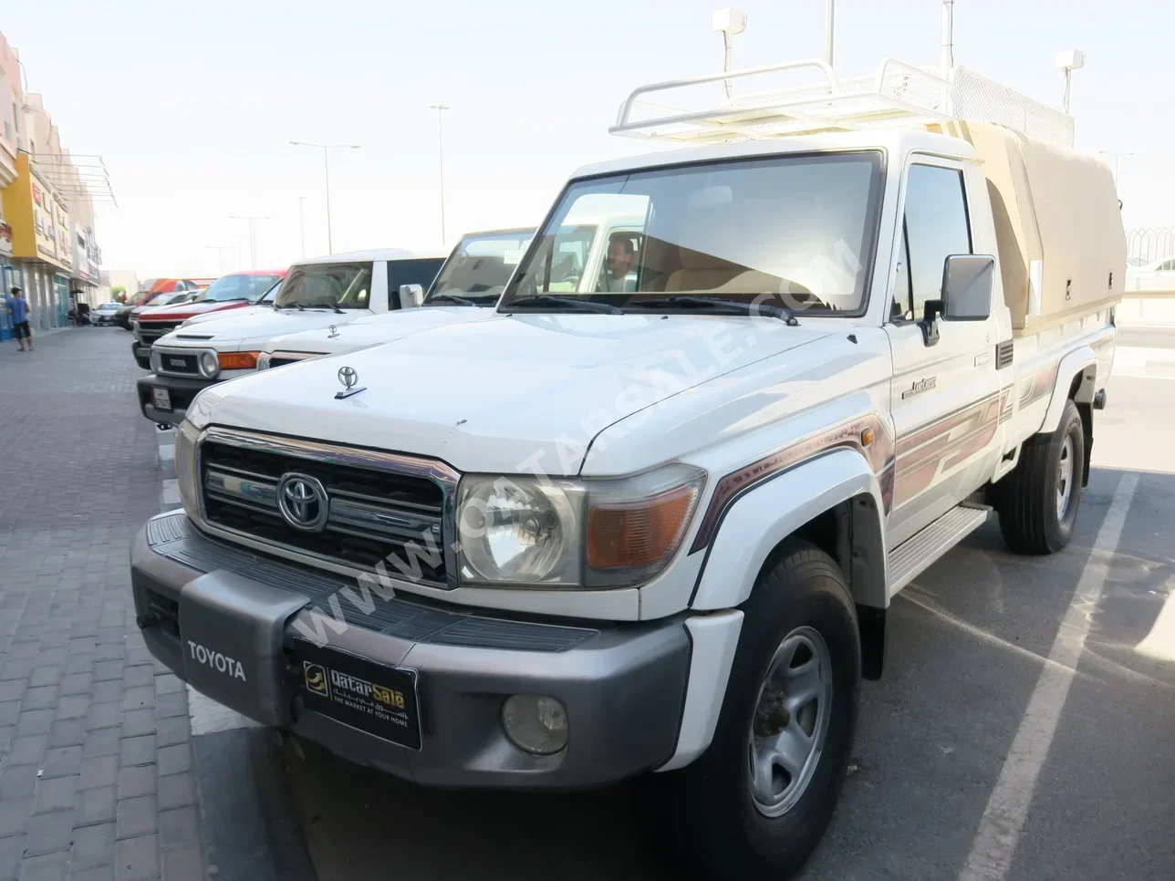 Toyota  Land Cruiser  LX  2009  Manual  100,000 Km  6 Cylinder  Four Wheel Drive (4WD)  Pick Up  White  With Warranty