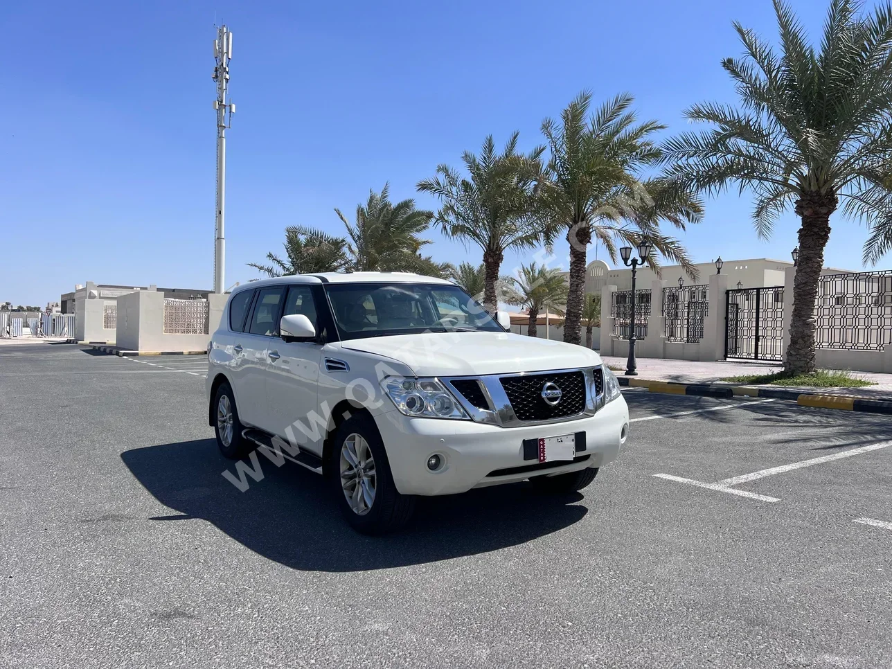 Nissan  Patrol  LE  2010  Automatic  392,000 Km  8 Cylinder  Four Wheel Drive (4WD)  SUV  White