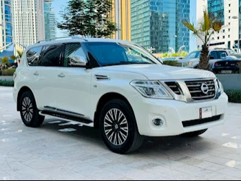 Nissan  Patrol  Platinum  2015  Automatic  127,000 Km  8 Cylinder  Four Wheel Drive (4WD)  SUV  White