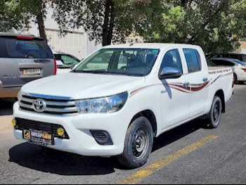 Toyota  Hilux  2019  Automatic  64,000 Km  4 Cylinder  Rear Wheel Drive (RWD)  Pick Up  White