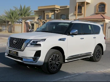 Nissan  Patrol  Platinum  2023  Automatic  6,063 Km  6 Cylinder  Four Wheel Drive (4WD)  SUV  White  With Warranty