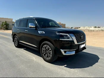 Nissan  Patrol  Platinum  2023  Automatic  18,000 Km  6 Cylinder  Four Wheel Drive (4WD)  SUV  Black  With Warranty