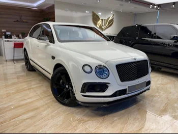 Bentley  Bentayga  2017  Automatic  58,000 Km  12 Cylinder  Four Wheel Drive (4WD)  SUV  White