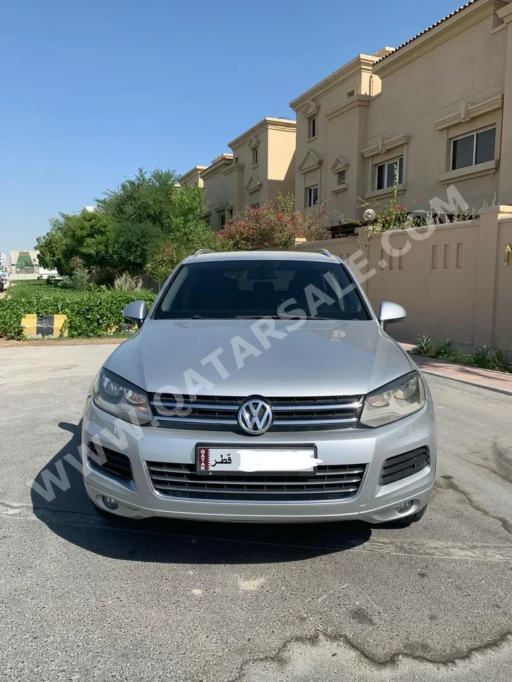 Volkswagen  Touareg  2014  Automatic  190,000 Km  6 Cylinder  All Wheel Drive (AWD)  SUV  Silver