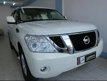 Nissan  Patrol  SE  2013  Automatic  260,000 Km  8 Cylinder  Four Wheel Drive (4WD)  SUV  White