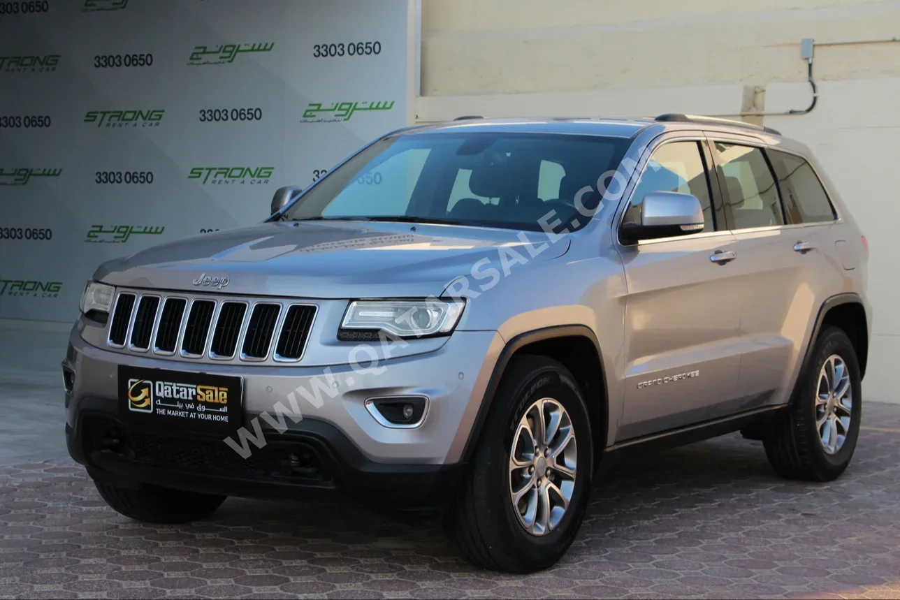  Jeep  Grand Cherokee  Laredo  2015  Automatic  223,000 Km  6 Cylinder  Four Wheel Drive (4WD)  SUV  Silver  With Warranty