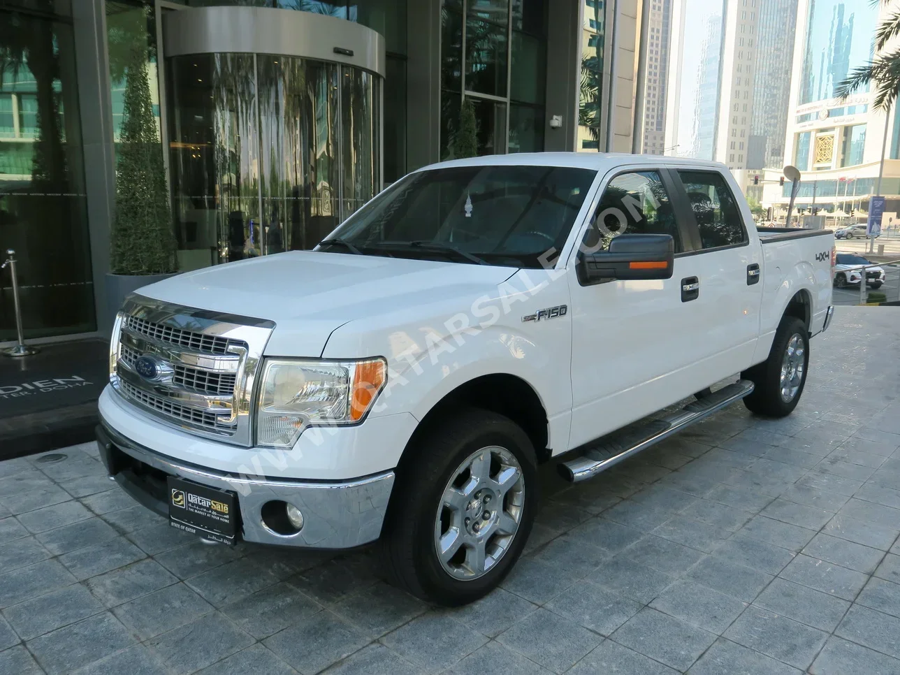 Ford  F  150 XLT  2013  Automatic  157,000 Km  8 Cylinder  Four Wheel Drive (4WD)  Pick Up  White