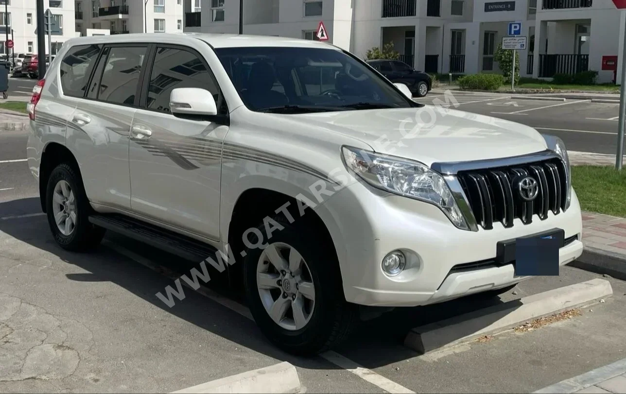 Toyota  Prado  TXL  2014  Automatic  180,000 Km  4 Cylinder  Four Wheel Drive (4WD)  SUV  White