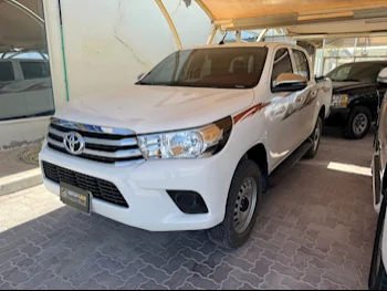 Toyota  Hilux  2023  Manual  10,000 Km  4 Cylinder  Four Wheel Drive (4WD)  Pick Up  White  With Warranty