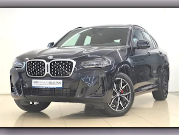 BMW  X-Series  X4  2022  Automatic  38,900 Km  4 Cylinder  All Wheel Drive (AWD)  SUV  Black  With Warranty