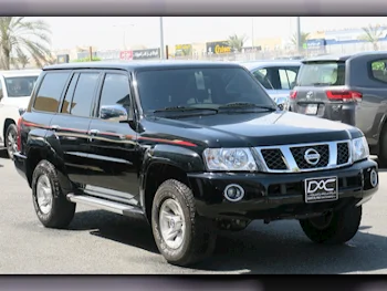 Nissan  Patrol  Safari  2024  Manual  8,000 Km  6 Cylinder  Four Wheel Drive (4WD)  SUV  Black  With Warranty