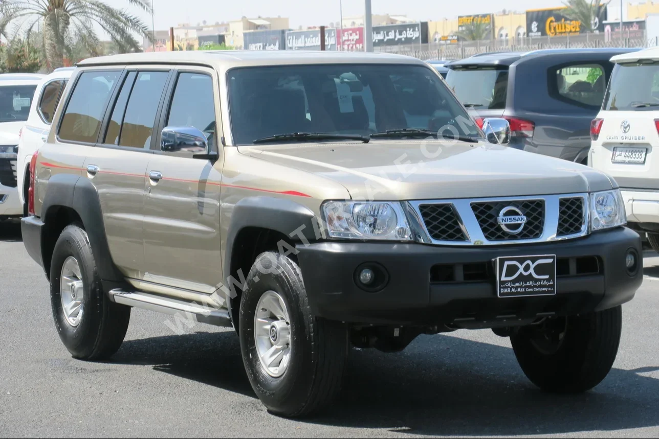 Nissan  Patrol  GL  2021  Manual  56,000 Km  6 Cylinder  Four Wheel Drive (4WD)  SUV  Light Gold  With Warranty