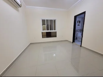 2 Bedrooms  Apartment  For Rent  in Doha -  Al Mansoura  Not Furnished